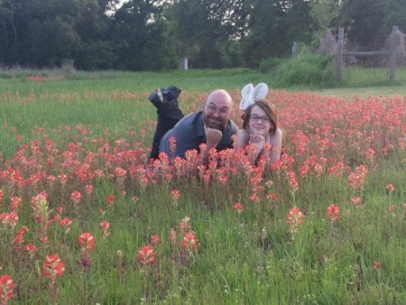 Arielle posing in the flowers with her dad -- the kids have a great relationship with him, too!